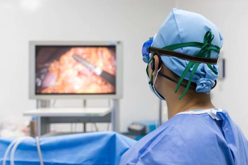 surgeon looking at screen