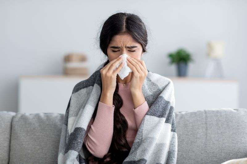 woman with runny nose